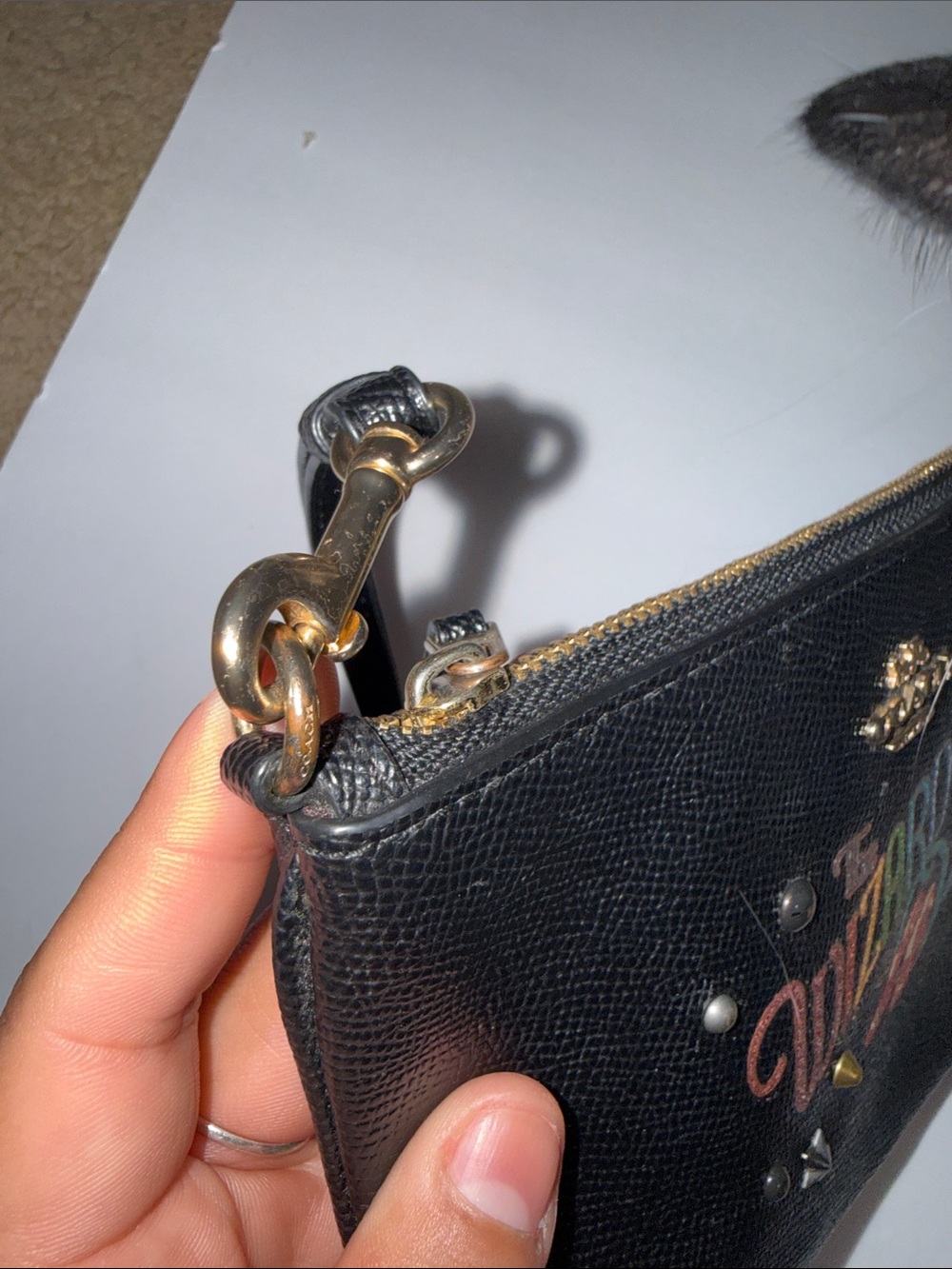 Coach Black Wristlet Pouch with Multicolor Wizard of Oz Graphic - Picture 2 of 2